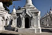 Myanmar - Mandalay, Kuthodaw Pagoda. 729 white pitaka pagodas contain the Tipitaka, the sacred texts of Theravada Buddhism. 